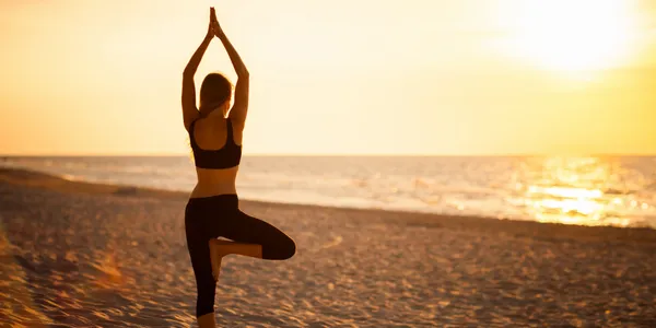 Yoga instructor demonstrating pose at PickLookupOnline studio